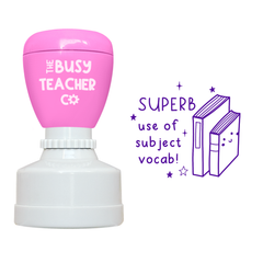 Refillable primary teacher marking Stamp reading 'superb use of subject vocab', inked in pink ink.