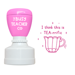 Teacher Stamp reading 'I think this is Tea-rrific', inked in pink ink.